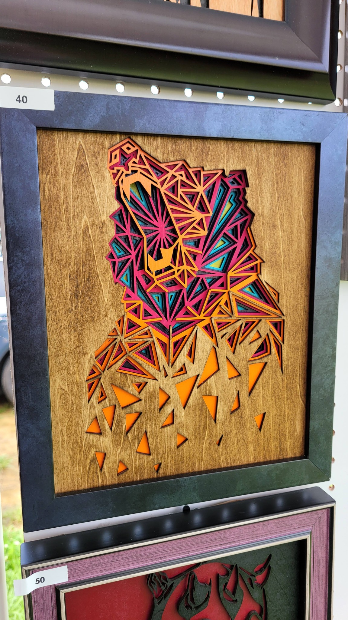 Laser-cut wood art of a bear